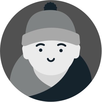 A wrapped baby wearing a wool hat
